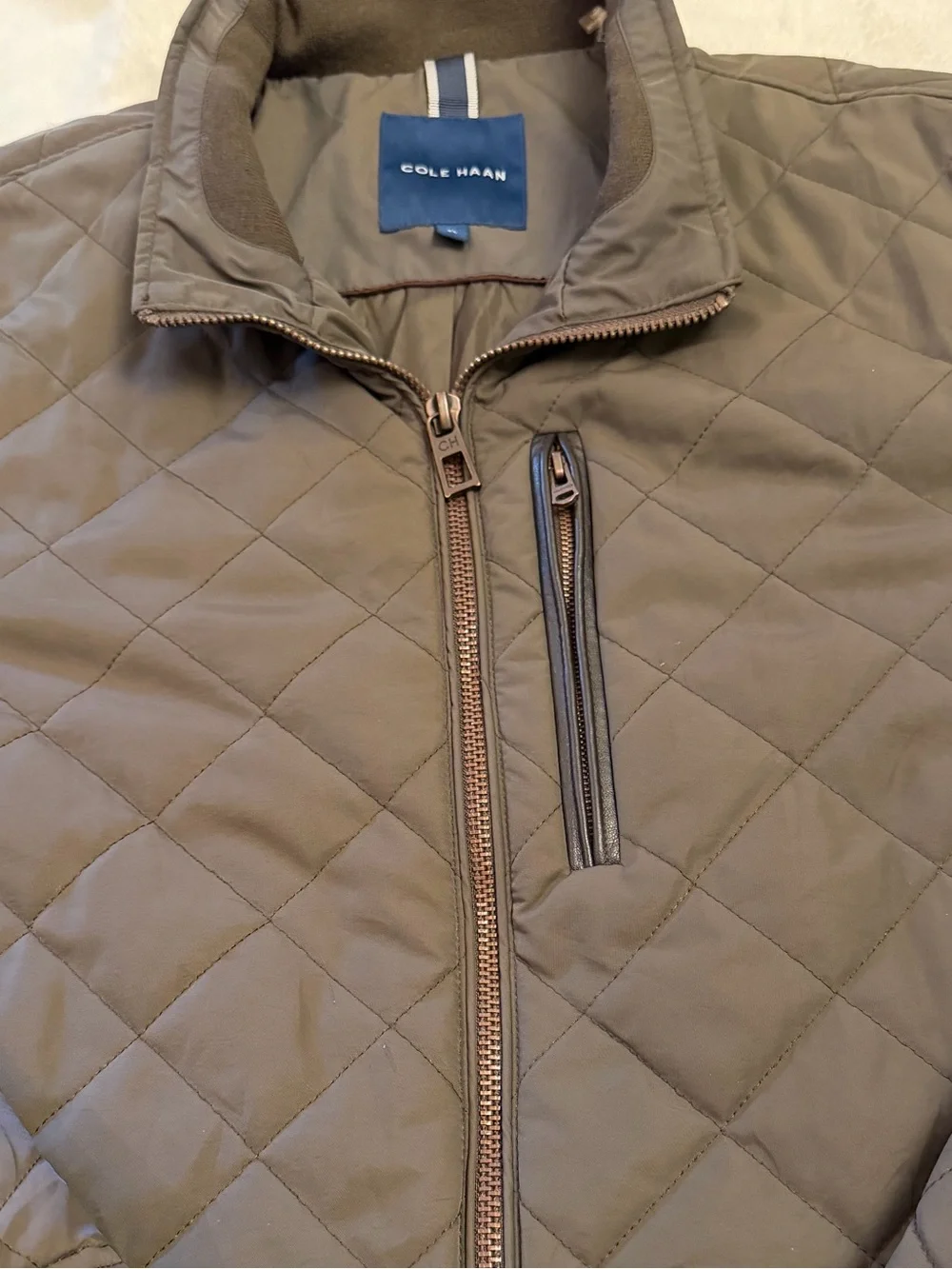 Cole Haan 85% features 15%